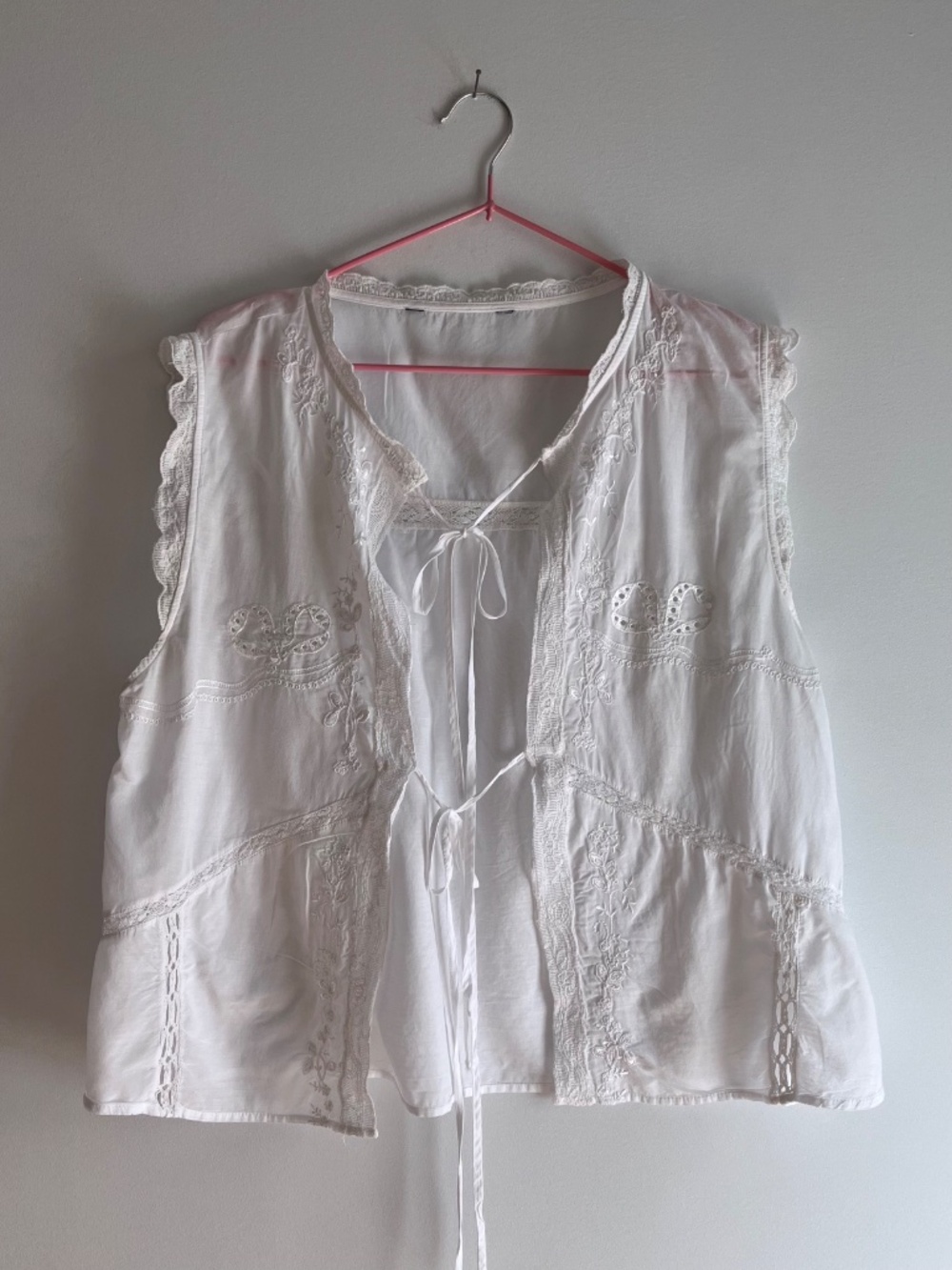Delicate embroidered tie-front blouse in white